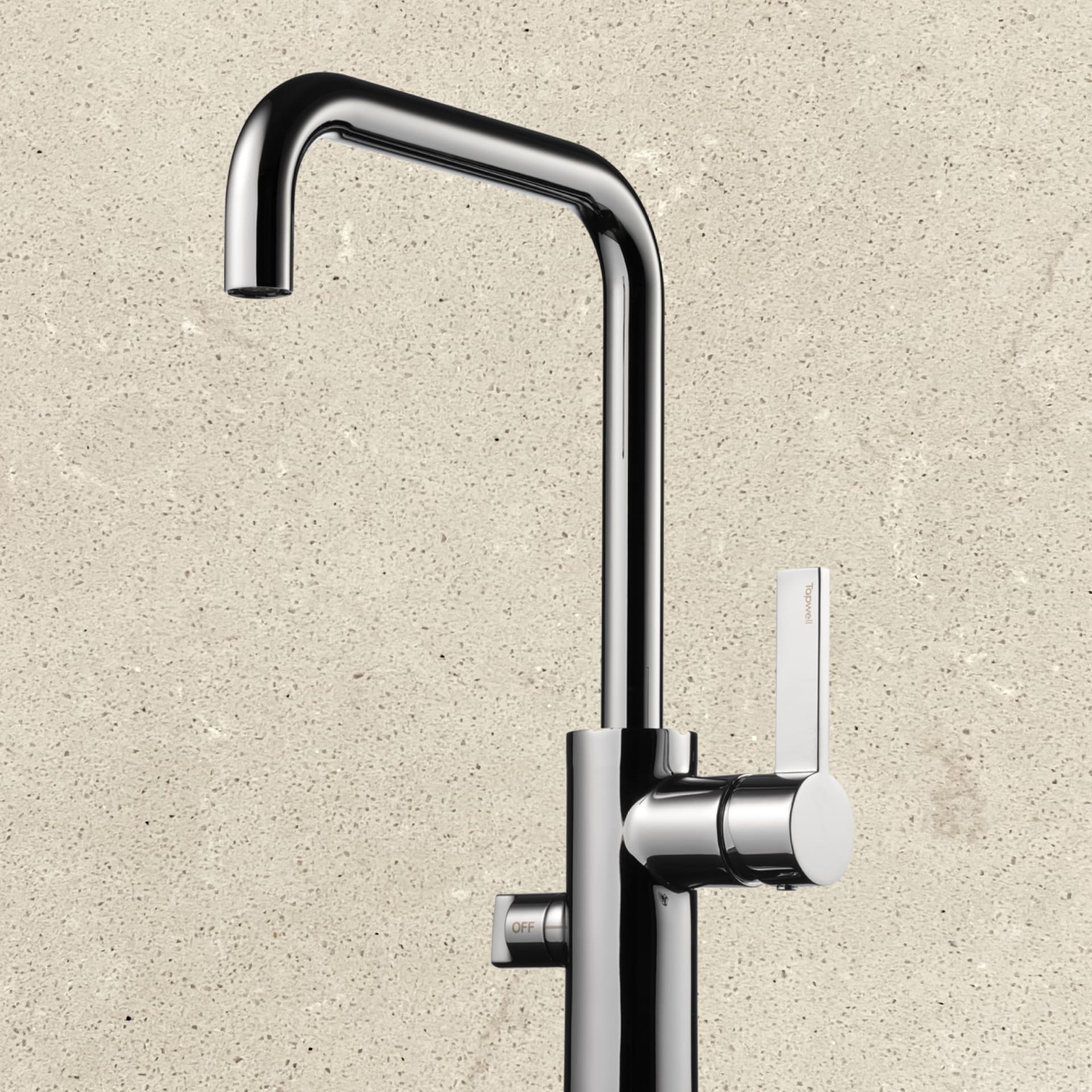Chrome coloured kitchen faucet and countertop in style Soft